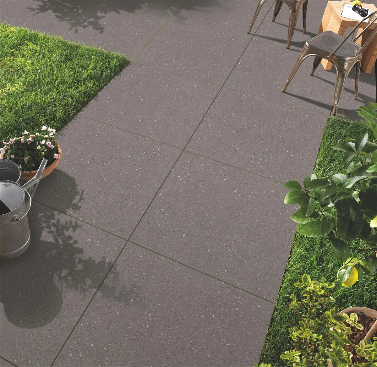 Porcelain vs Natural Stone Patio Tiles: UK Climate Comparison